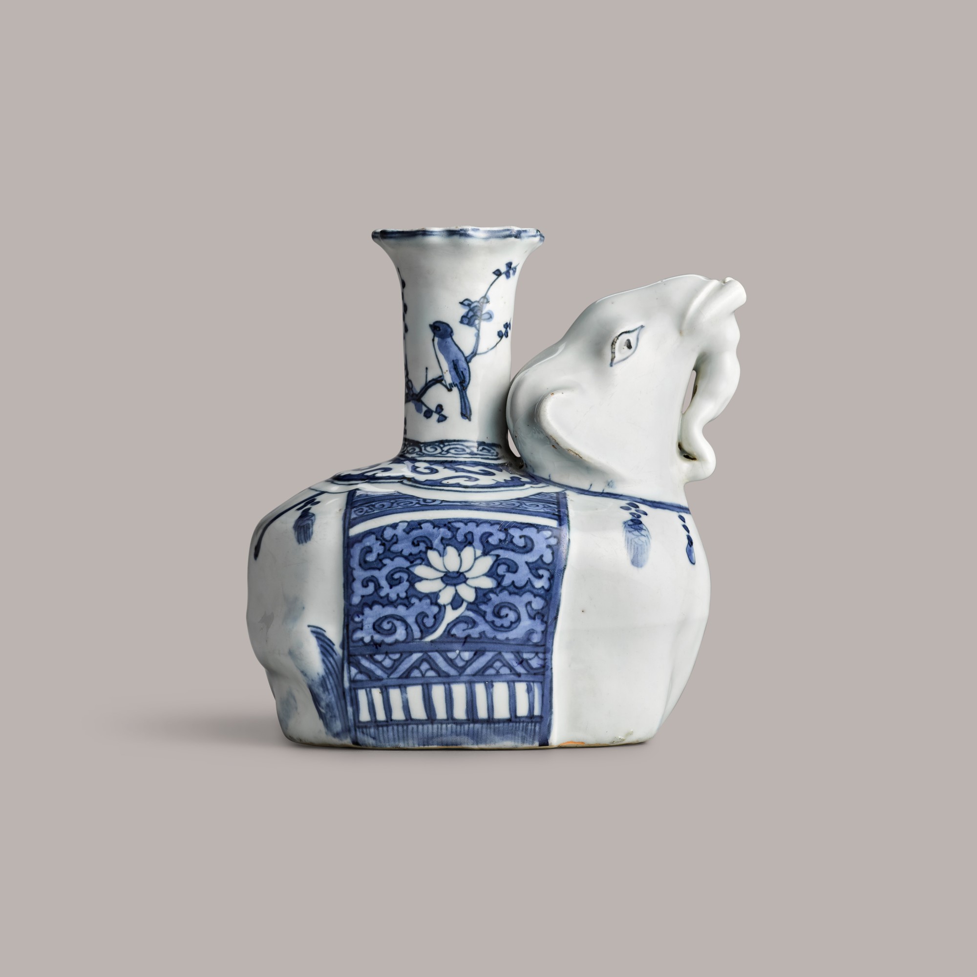 A rare blue and white 'elephant' kendi — 明萬曆 青花瑞象形君持