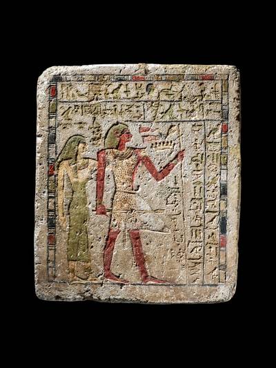 An Egyptian Polychrome Limestone Stela