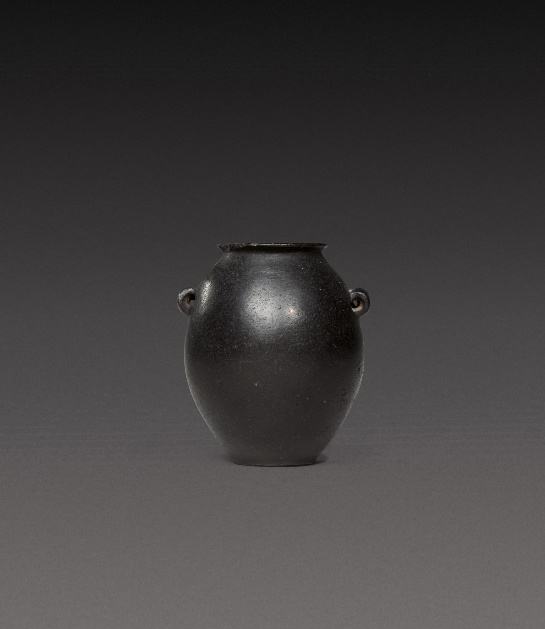 An Egyptian Black Basalt Jar — An Egyptian Black Basalt Jar, Predynastic Period (Naqada II)/1st Dynasty, circa 3500-2900 B.C.