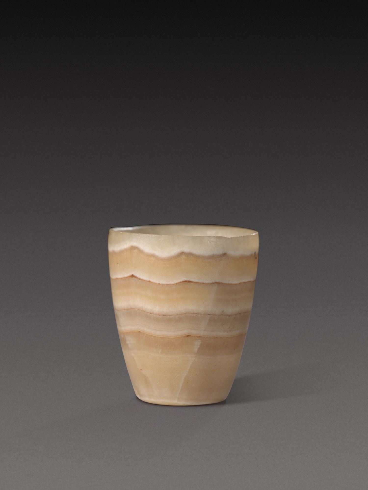 An Egyptian Banded Alabaster Cup — An Egyptian Banded Alabaster Cup, Old Kingdom, probably 1st Dynasty, 2965-2815 B.C.