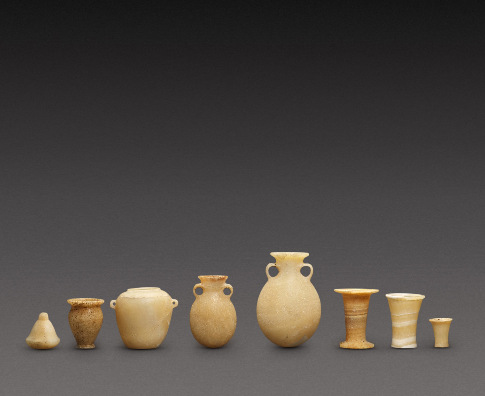Eight Egyptian Alabaster Miniature Vessels — Eight Egyptian Alabaster Miniature Vessels, 3rd/2nd millennium B.C.