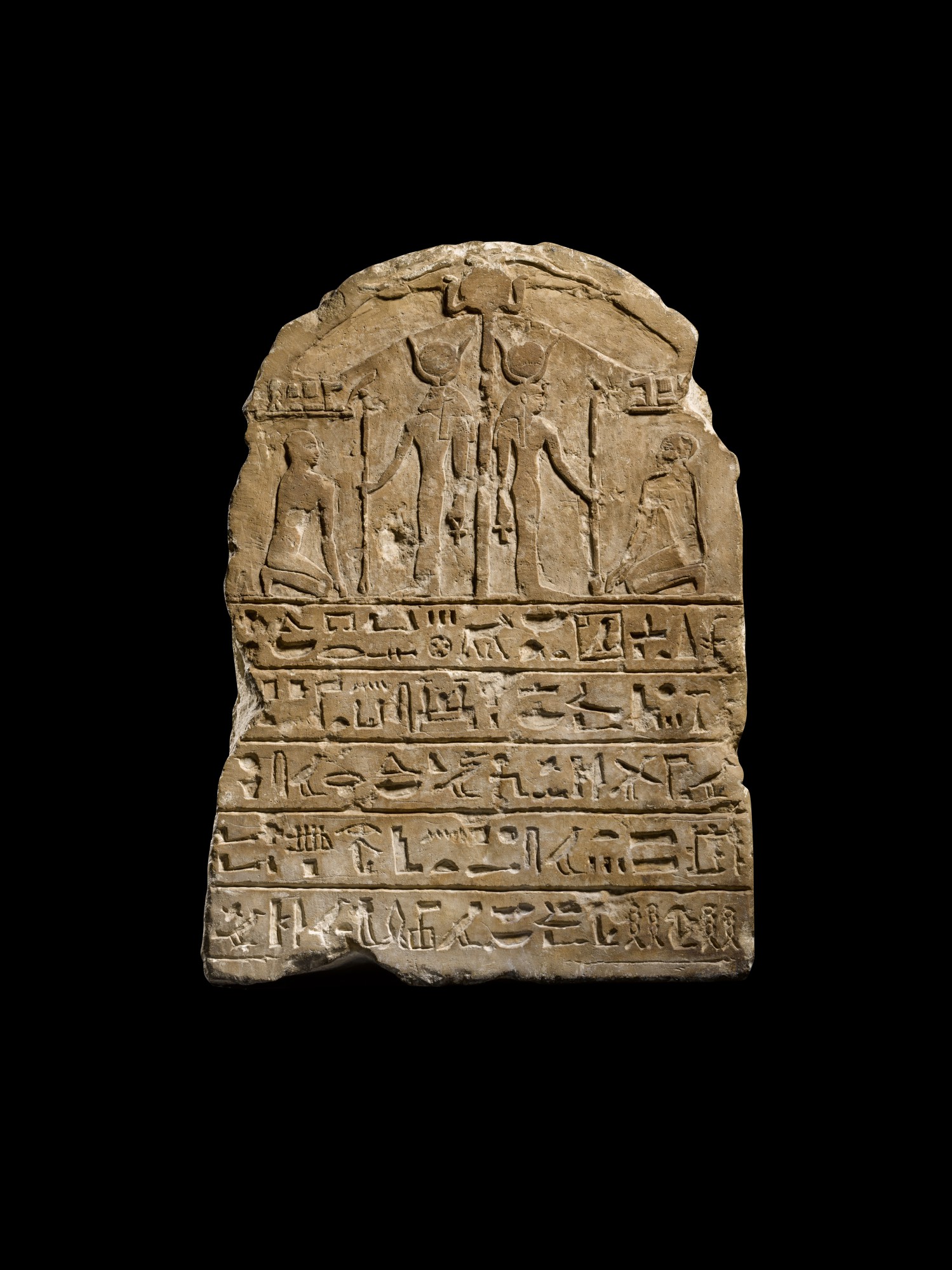 Another Property — An Egyptian Limestone Round-topped Stela, early 26th Dynasty, circa 664-600 B.C.