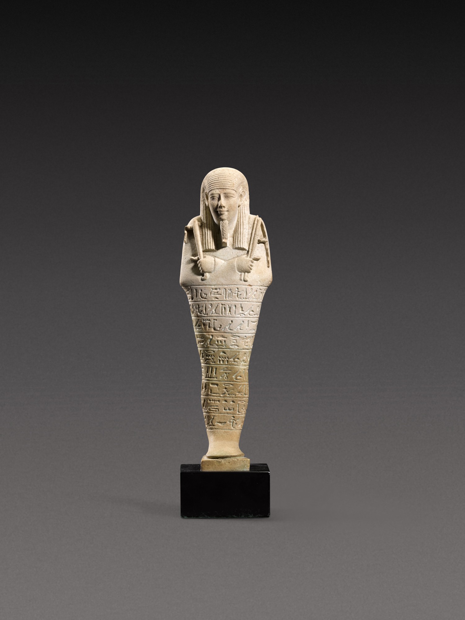 Another Property — An Egyptian Pale Blue-green Ushabti of Horudja, 30th Dynasty, 380-342 B.C.