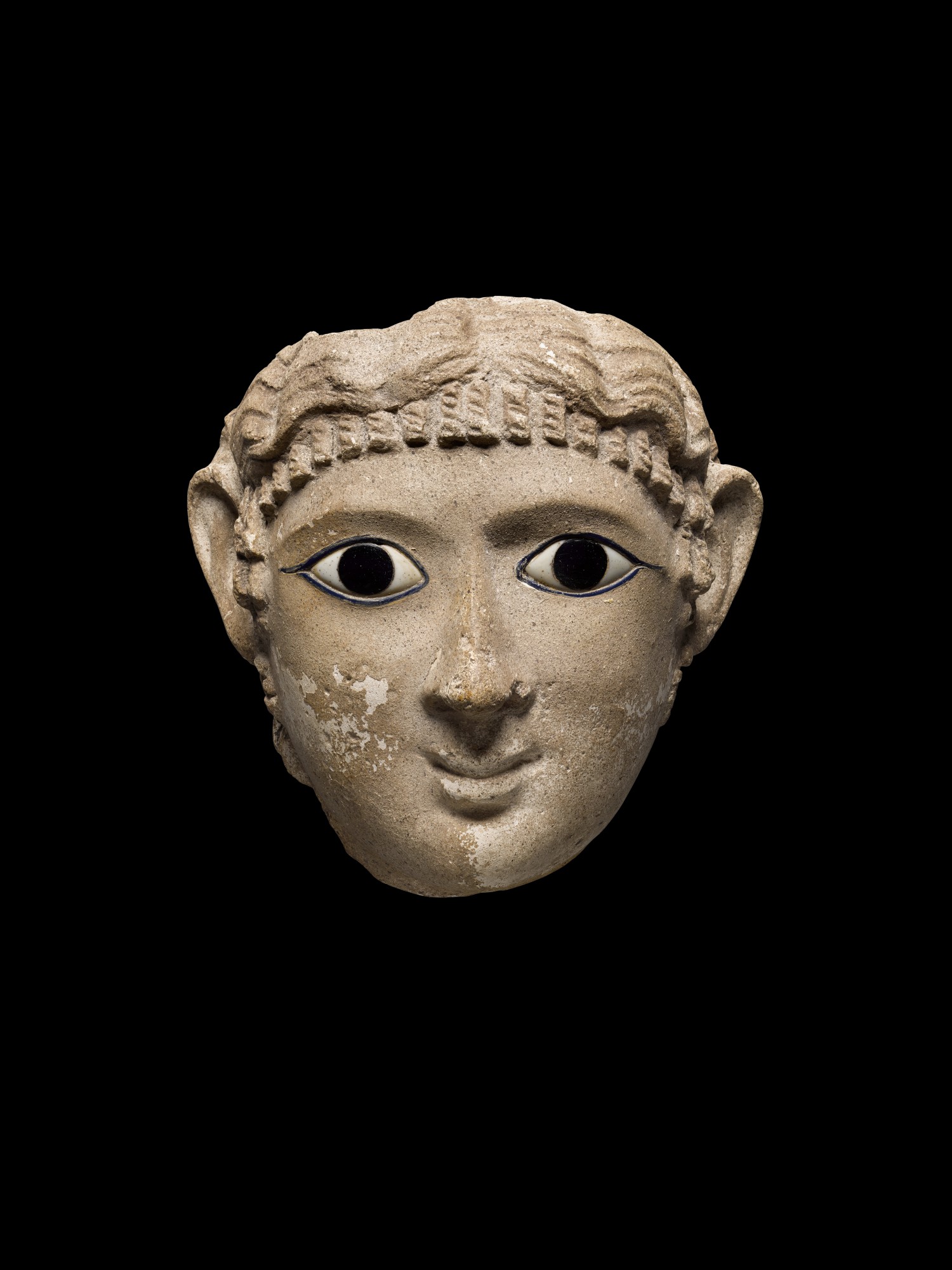 An Egyptian Stucco Mummy Mask of a Woman — An Egyptian Stucco Mummy Mask of a Woman, Roman Period, Trajanic/early Hadrianic, circa 100-120 A.D.