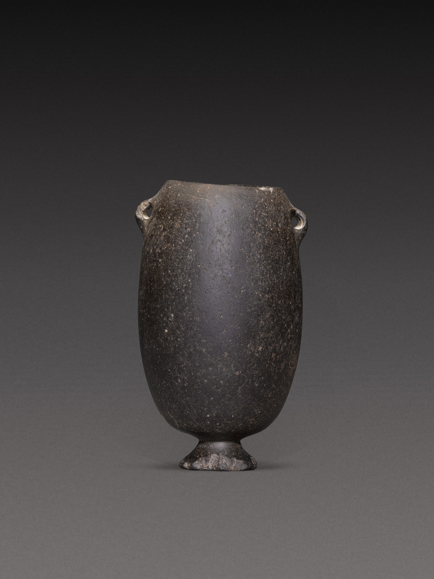 An Egyptian Basalt Jar — An Egyptian Basalt Jar, Predynastic Period, Naqada I/II, circa 4000-3200 B.C.