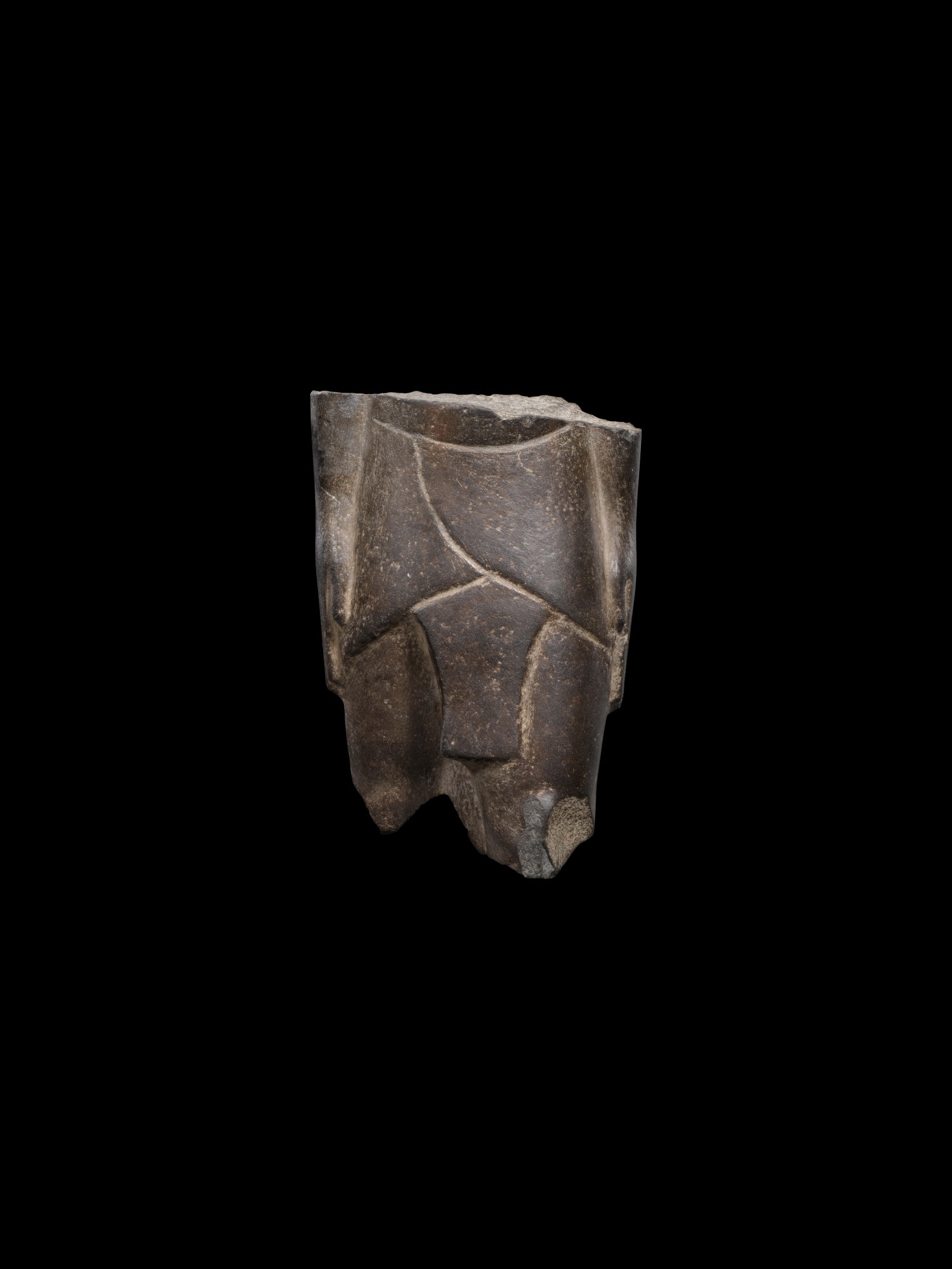 An Egyptian Basalt Torso of a Man — An Egyptian Basalt Torso of a Man, 26th/30th Dynasty, 664-342 B.C.