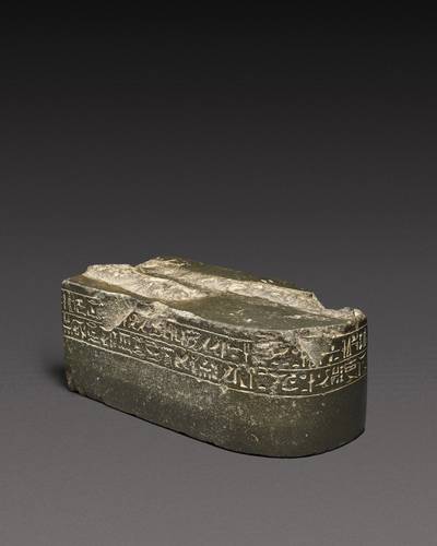An Egyptian Greywacke Inscribed Statue Base