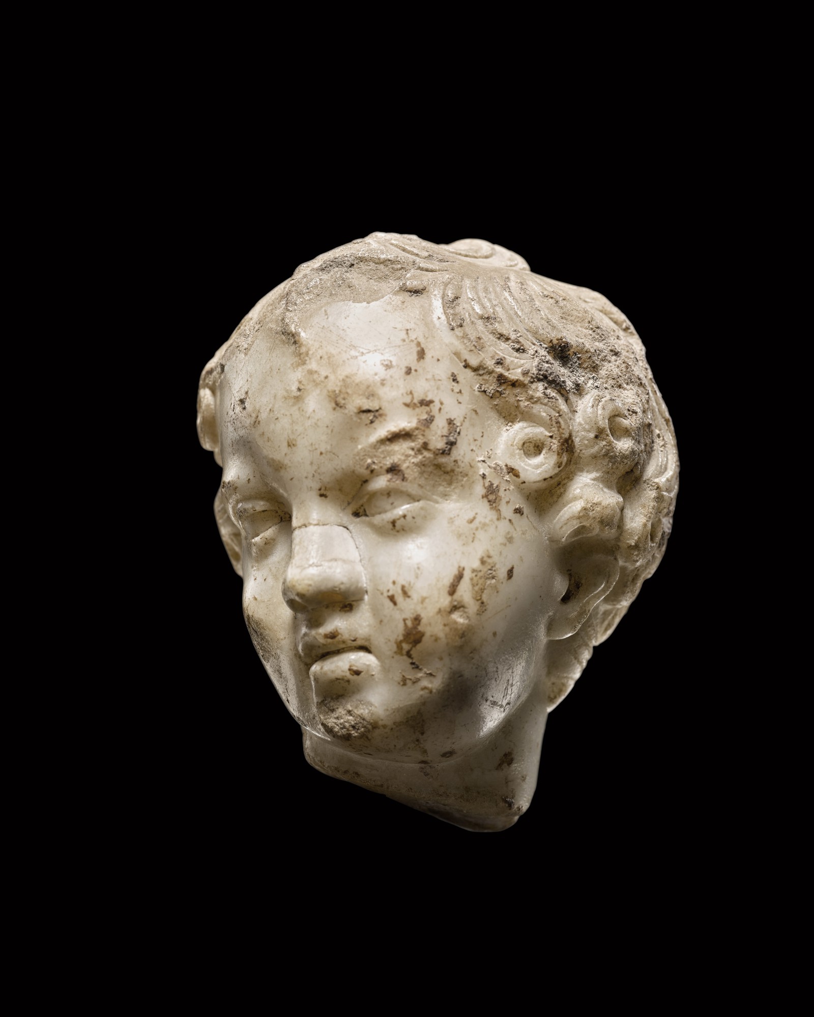 A Roman Marble Head of Eros — A Roman Marble Head of Eros, circa 1st/2nd Century A.D.