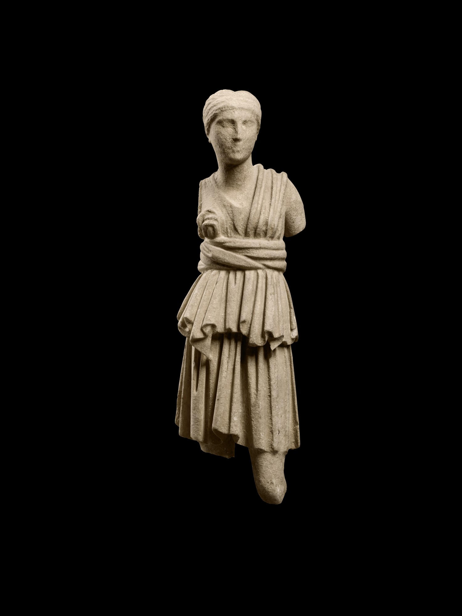 A Fragmentary Roman Marble Figure of Artemis — A Fragmentary Roman Marble Figure of Artemis, circa 2nd Century A.D.