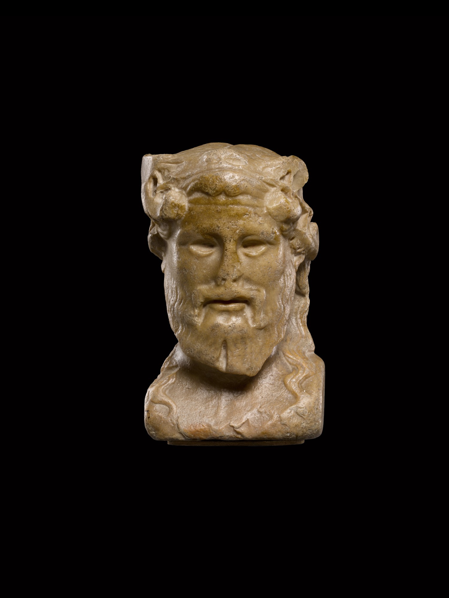 A Roman Giallo Antico Herm Bust of Zeus-Ammon, 1st/2nd Century A.D.