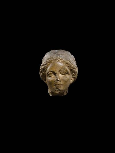 A Roman Marble Head of a Goddess, circa 1st/2nd Century A.D.