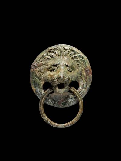 A Roman Bronze Lion Head Handle, 2nd/3rd Century A.D.