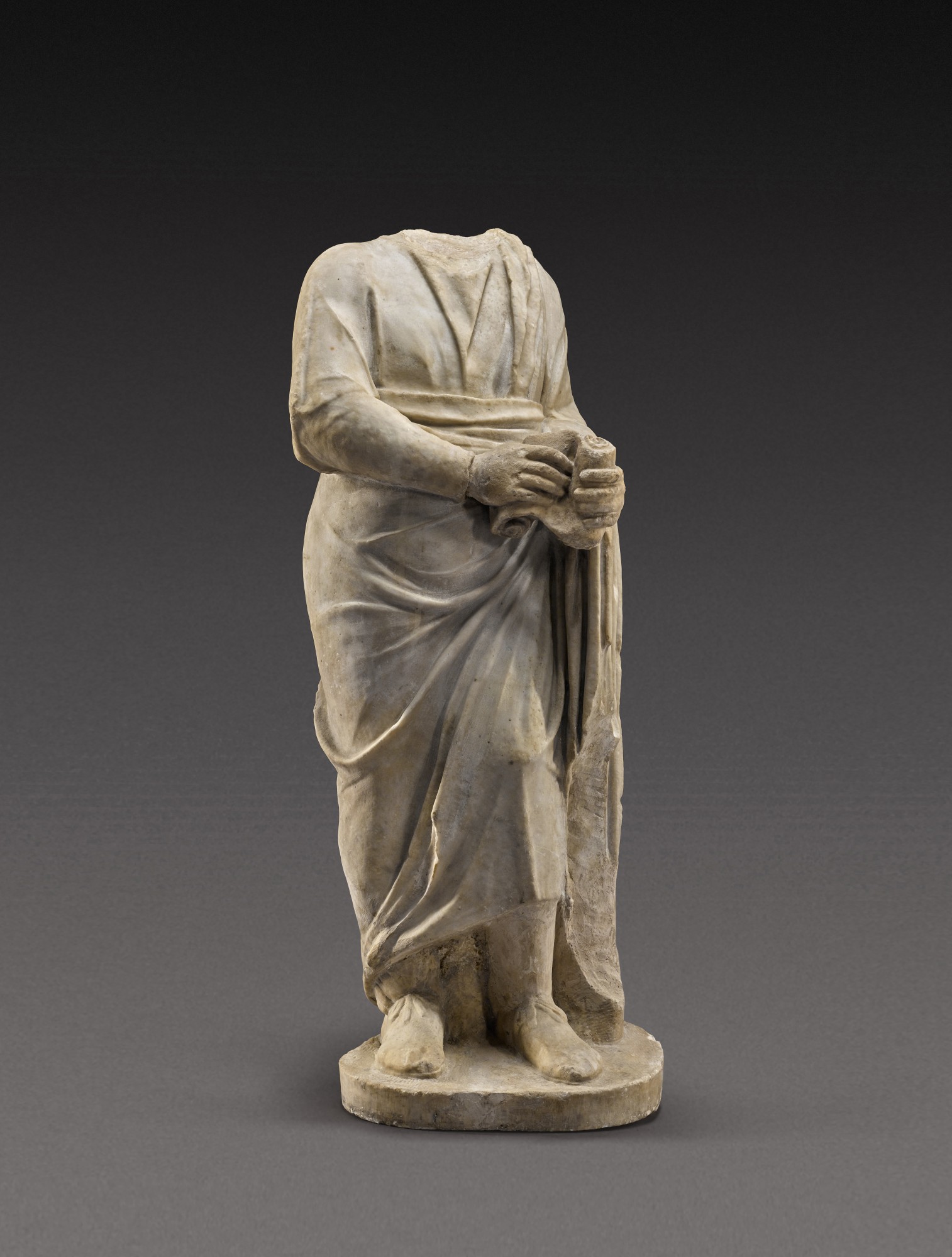 A Roman Marble Figure of a Philosopher or Man of Letters — A Roman Marble Figure of a Philosopher or Man of Letters, circa 2nd Century A.D.