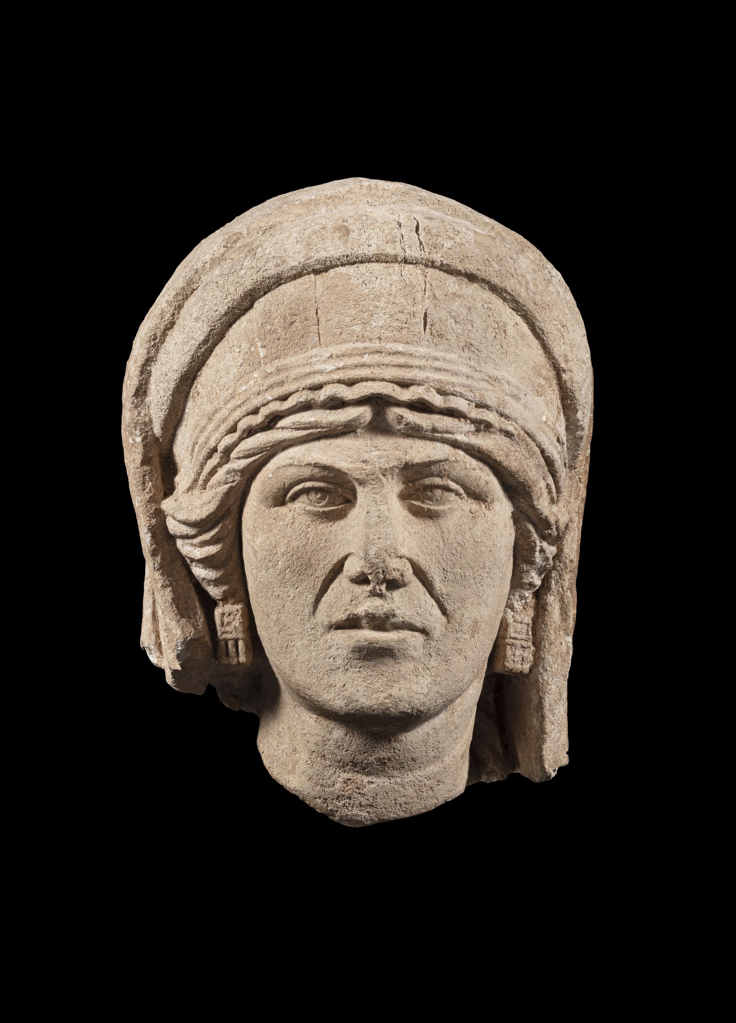 A Palmyrene Limestone Portrait Head of a Woman — A Palmyrene Limestone Portrait Head of a Woman, 2nd/3rd Century A.D.