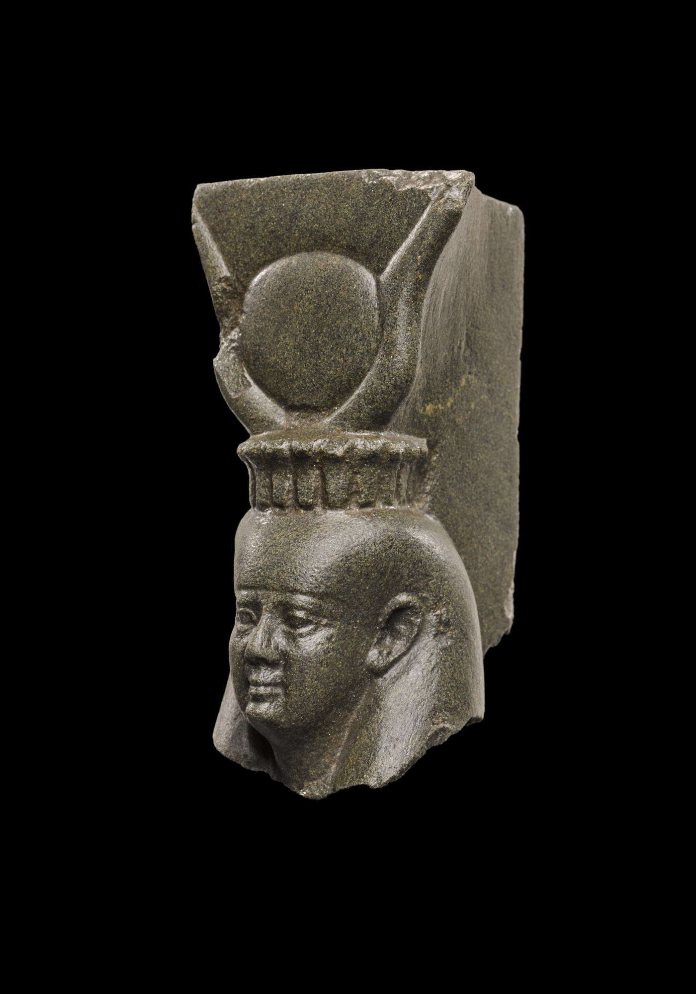 An Egyptian Greywacke or Green Schist Head of the Goddess Isis or Hathor — An Egyptian Greywacke or Green Schist Head of the Goddess Isis or Hathor, 26th Dynasty, 664-525 B.C.
