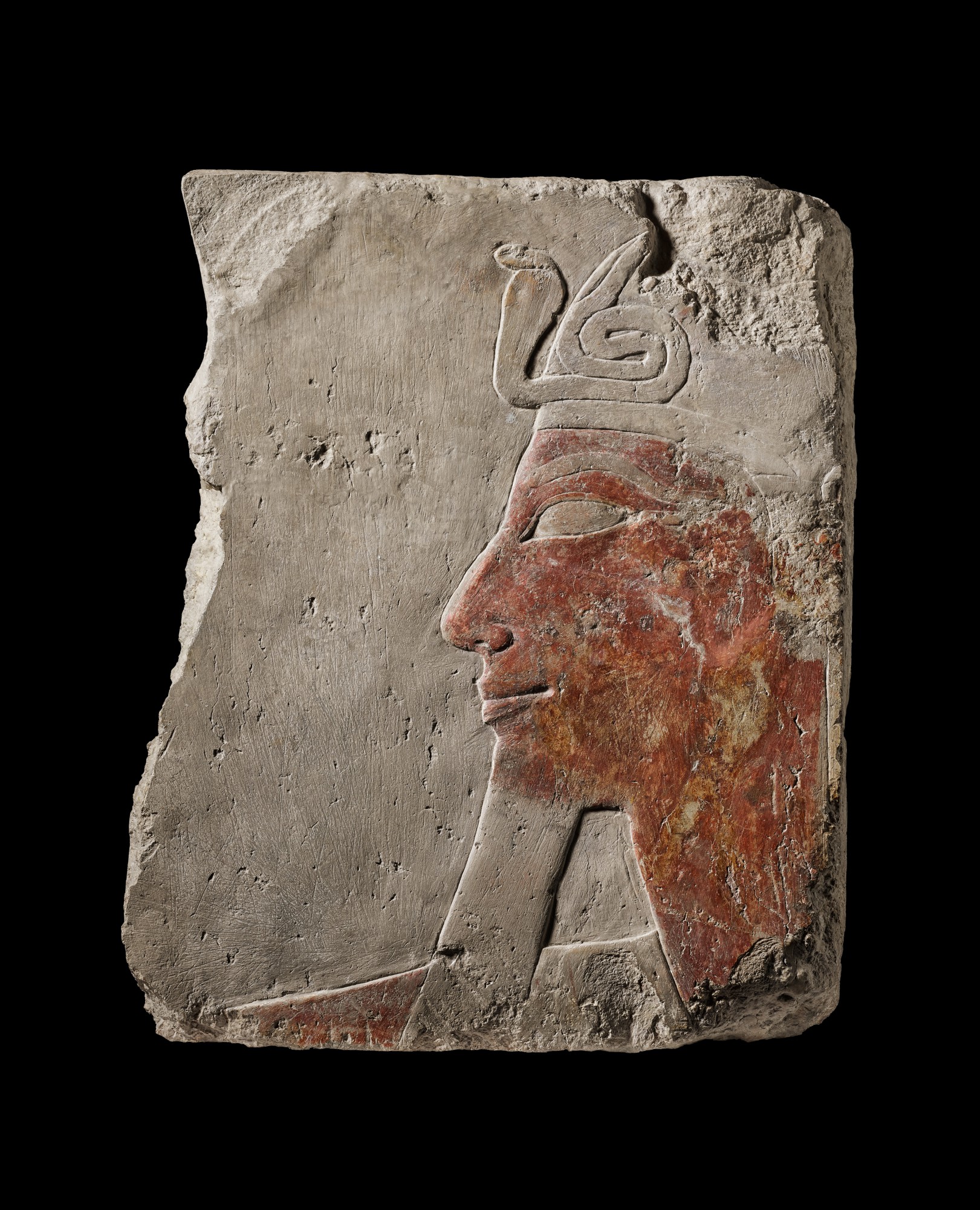An Egyptian Polychrome limestone Relief Fragment — An Egyptian Polychrome limestone Relief Fragment, 18th Dynasty, period of Hatshepsut/Tuthmosis III, 1479-1426 B.C.