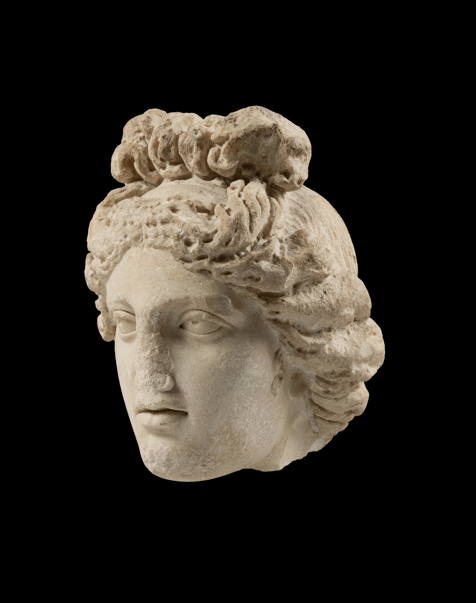A Roman Marble Head of Aphrodite, Eastern Mediterranean — A Roman Marble Head of Aphrodite, Eastern Mediterranean, circa 2nd Century A.D.