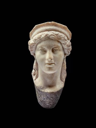 A Roman Marble Head of a Goddess, circa mid to late 2nd Century A.D.
