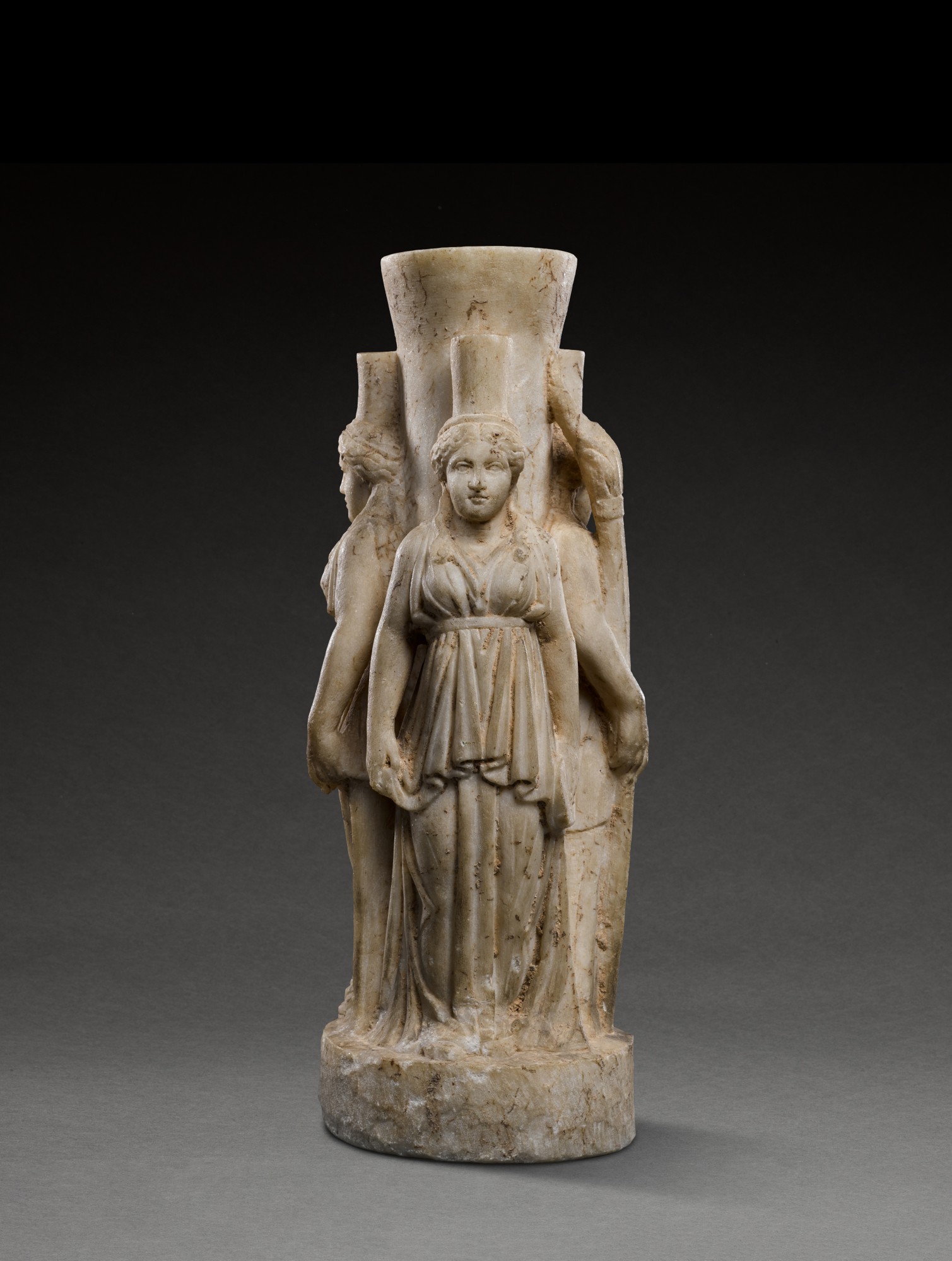 A Roman Marble Figure of Triple-bodied Hekate (Hekateion) — A Roman Marble Figure of Triple-bodied Hekate (Hekateion), 1st/2nd Century A.D.