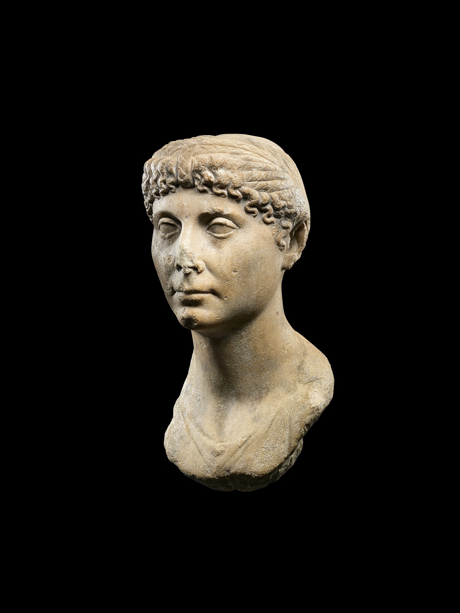 A Roman Marble Portrait Bust of a Woman — A Roman Marble Portrait Bust of a Woman, Augustan, circa early 1st Century A.D.