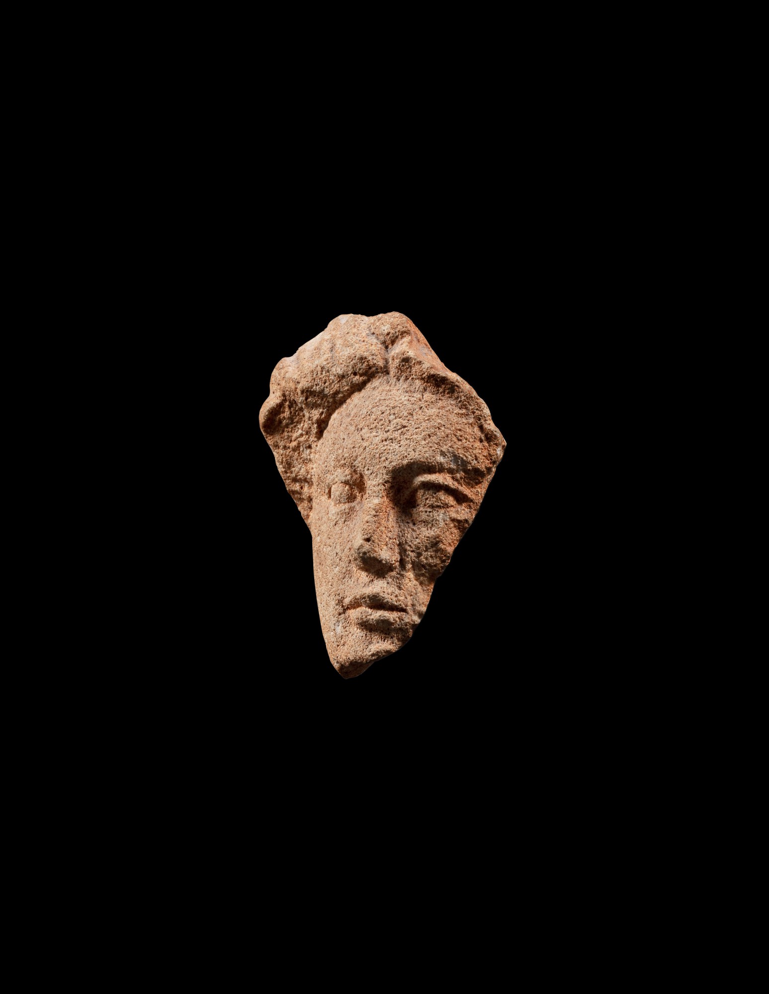 A Fragmentary Terracotta Head of a Woman or Goddess — A Fragmentary Terracotta Head of a Woman or Goddess, circa 4th/1st Century B.C.