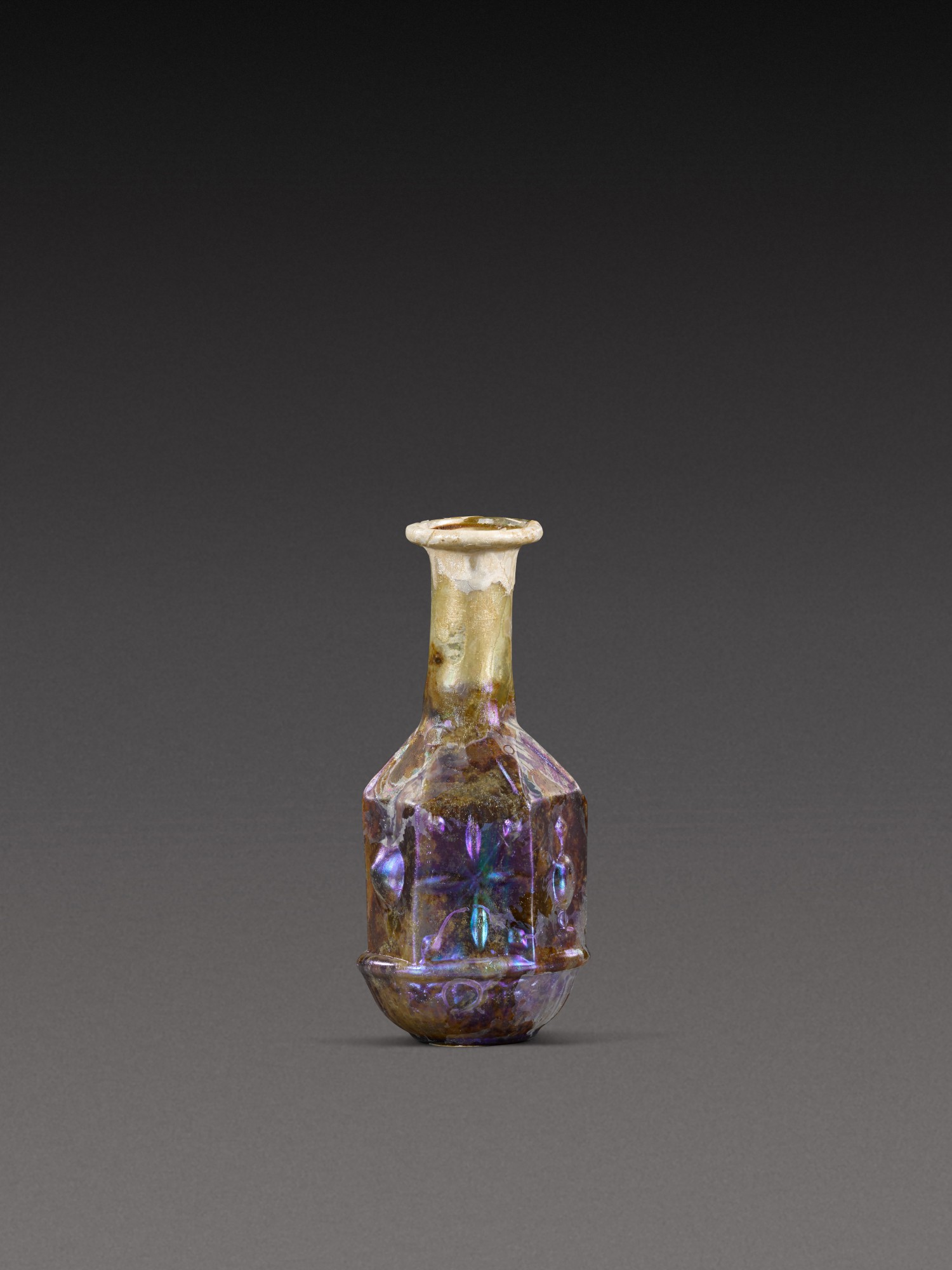 A Roman Mould-Blown Hexagonal Glass Flask — A Roman Mould-Blown Hexagonal Glass Flask, circa 1st Century A.D.