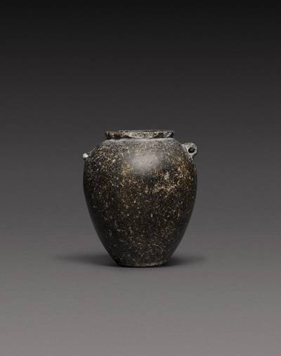 An Egyptian Basalt Jar, Predynastic Period (Naqada II)/1st Dynasty, circa 3500-2900 B.C.