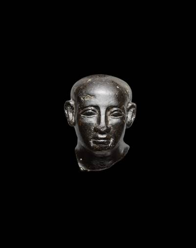 An Egyptian Basalt Head of a Man, 12th Dynasty, 1938-1759 B.C
