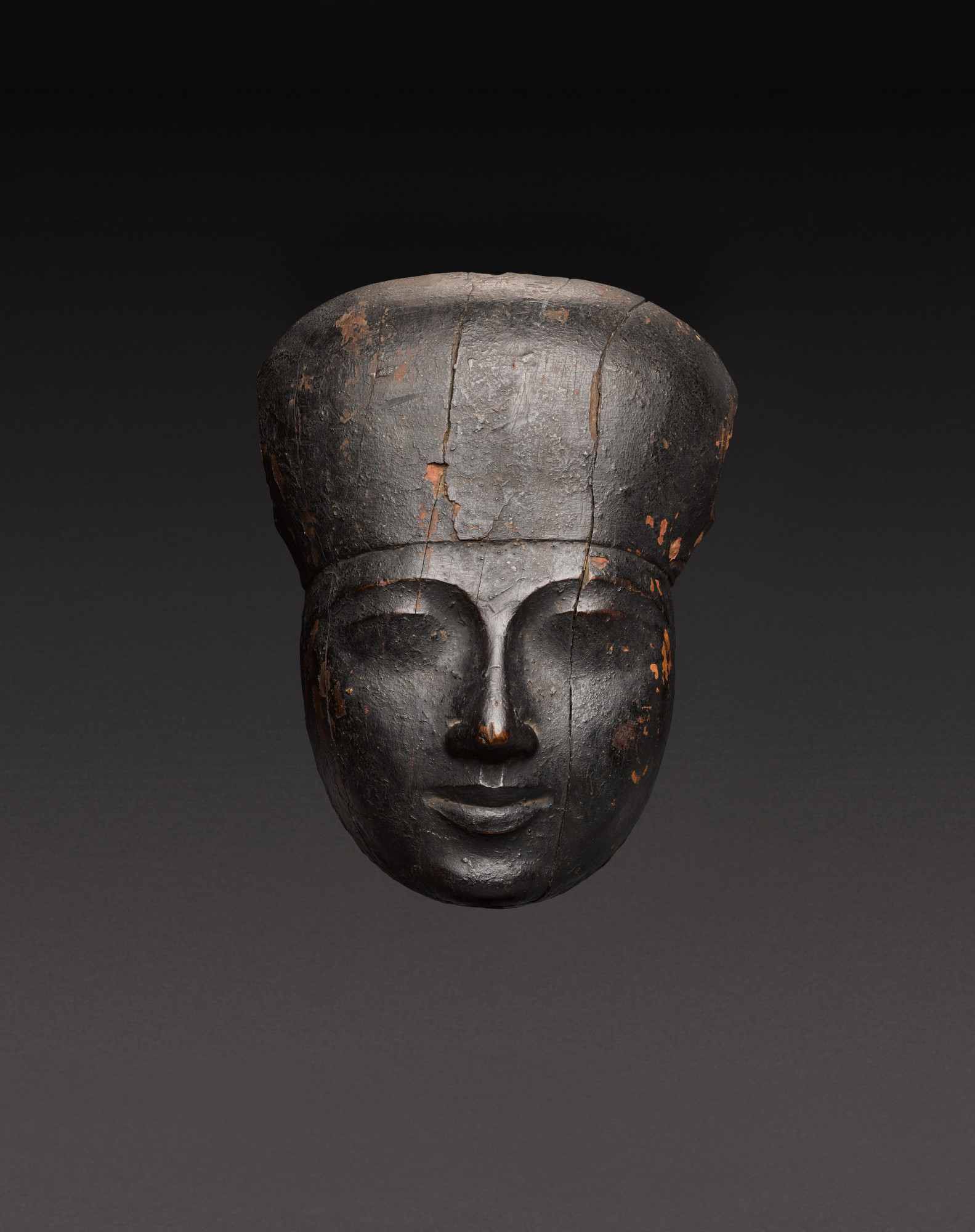 An Egyptian Wood Mummy Mask — An Egyptian Wood Mummy Mask, 21st/22nd Dynasty, 1075-716 B.C.
