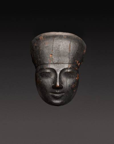An Egyptian Wood Mummy Mask, 21st/22nd Dynasty, 1075-716 B.C.
