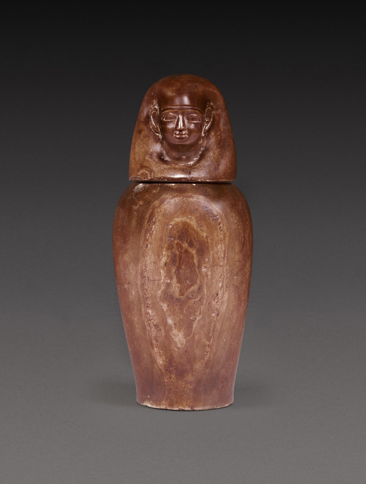 An Egyptian Banded Alabaster Canopic Jar — An Egyptian Banded Alabaster Canopic Jar, 26th Dynasty, 664-525 B.C.