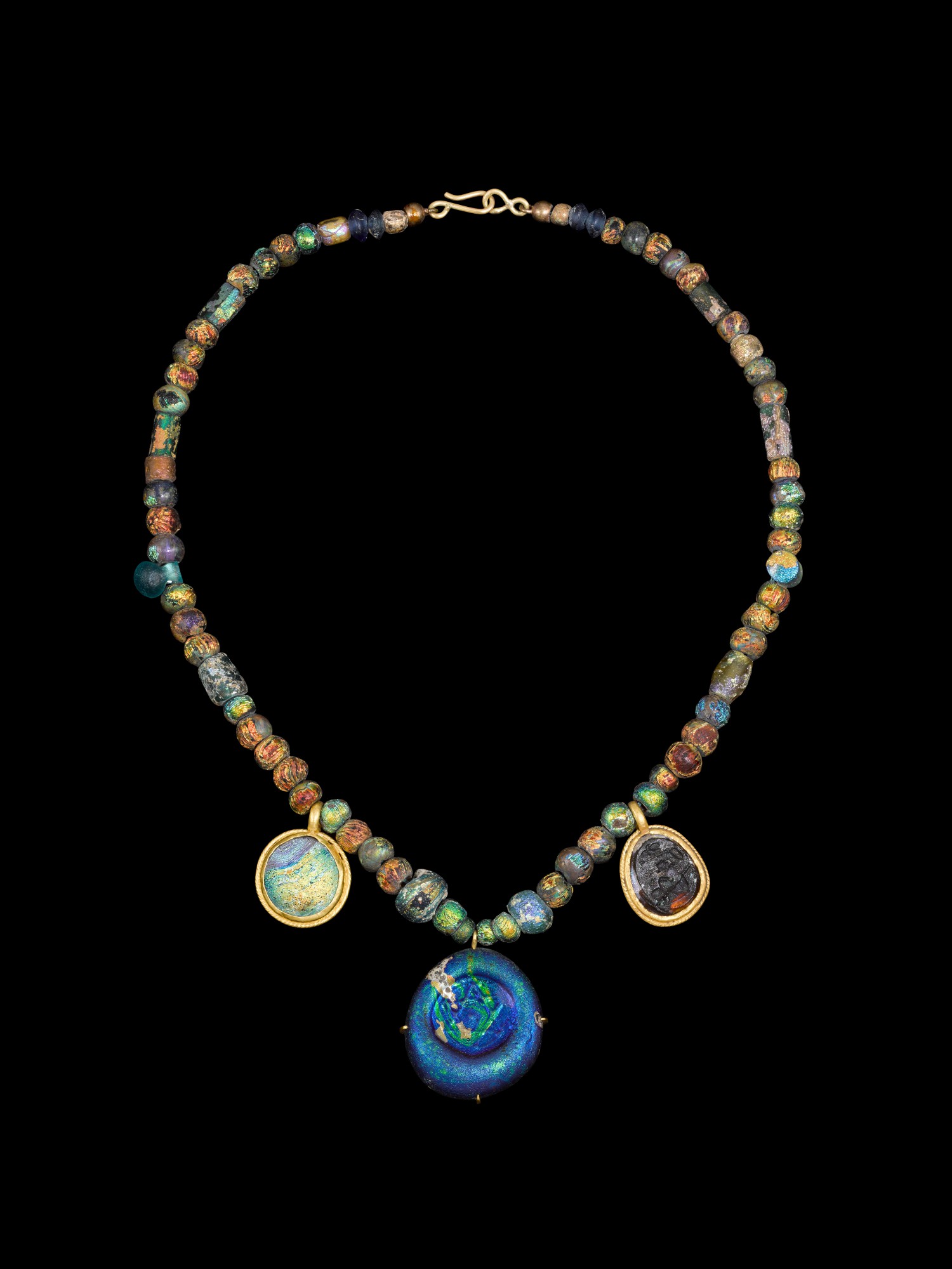 A Roman Glass Bead Necklace — A Roman Glass Bead Necklace, circa 2nd/3rd Century A.D.