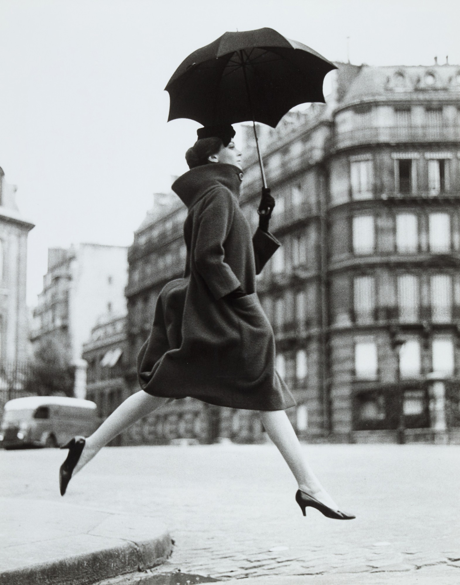 Richard Avedon — 'Carmen, Homage To Munkasci, Coat By Cardin, Place François Premier, Paris', 1957
