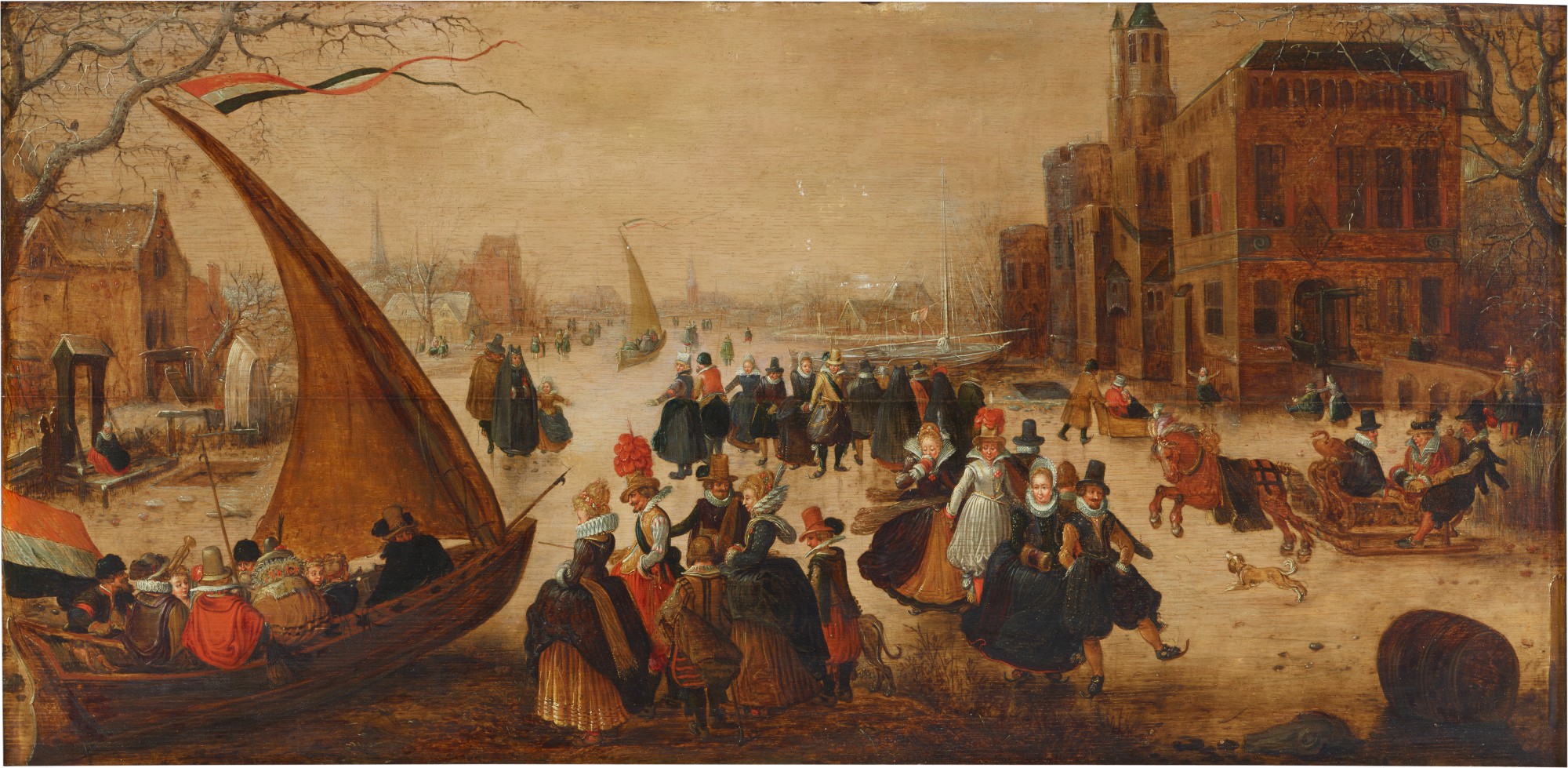 Winter landscape with numerous elegantly-dressed figures skating on a frozen river, with an ice yacht