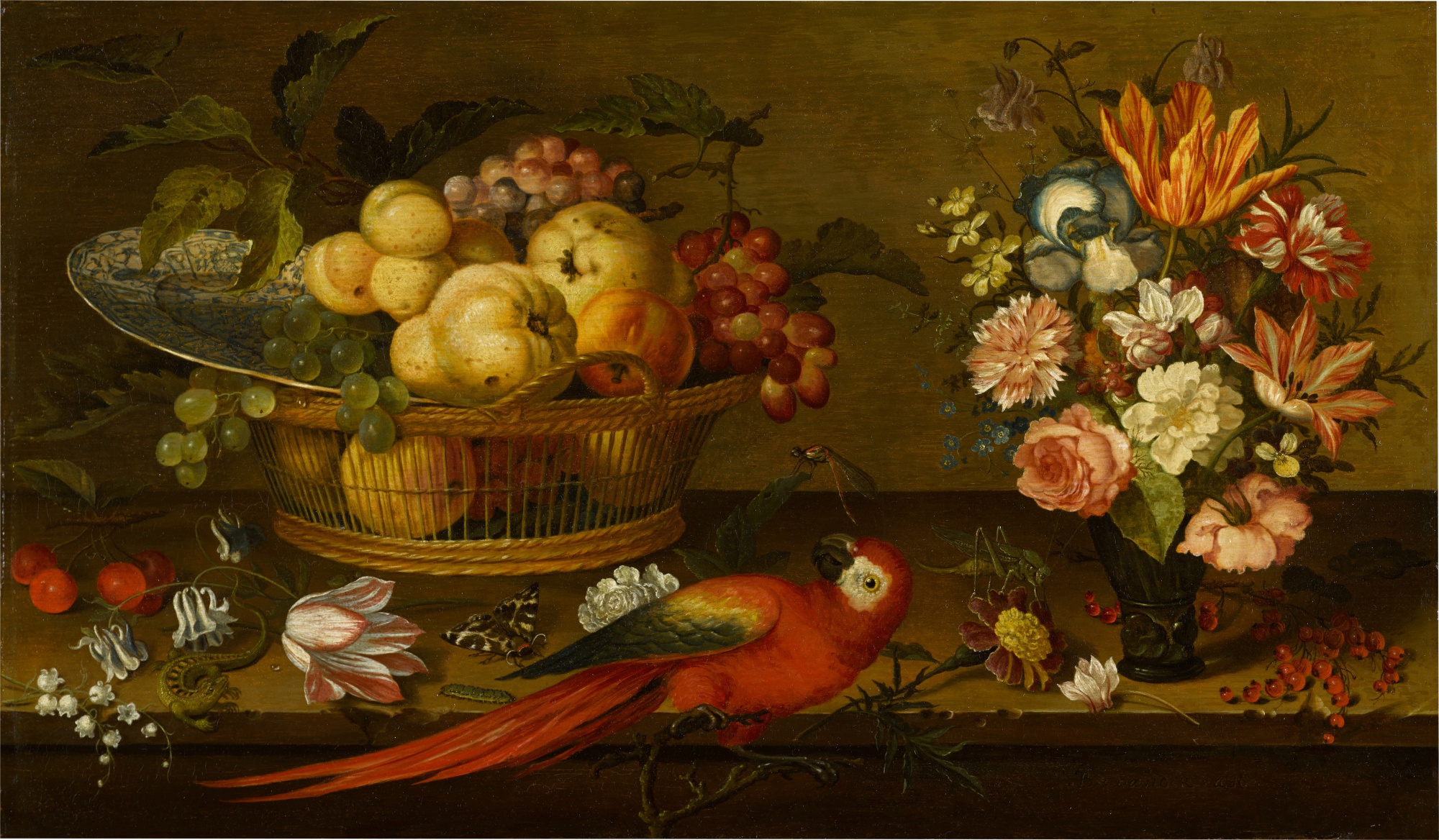 Still life with a basket of fruit and a Wanli Kraak porcelain dish, a vase of flowers, a parrot, a lizard and insects on a ledge