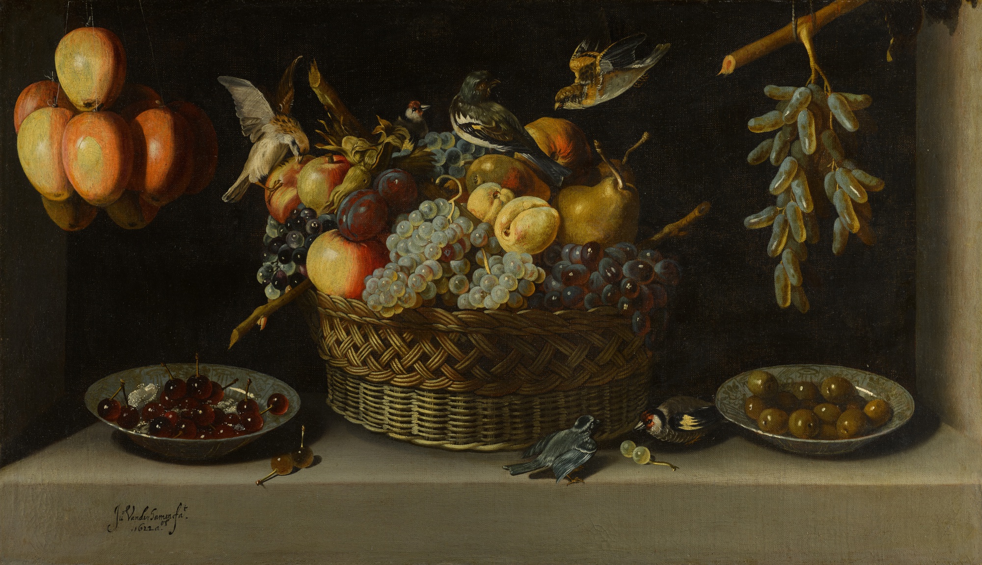 Juan van der Hamen y León — Still life with a basket of fruit with two plates of fruit and birds, all on a stone ledge