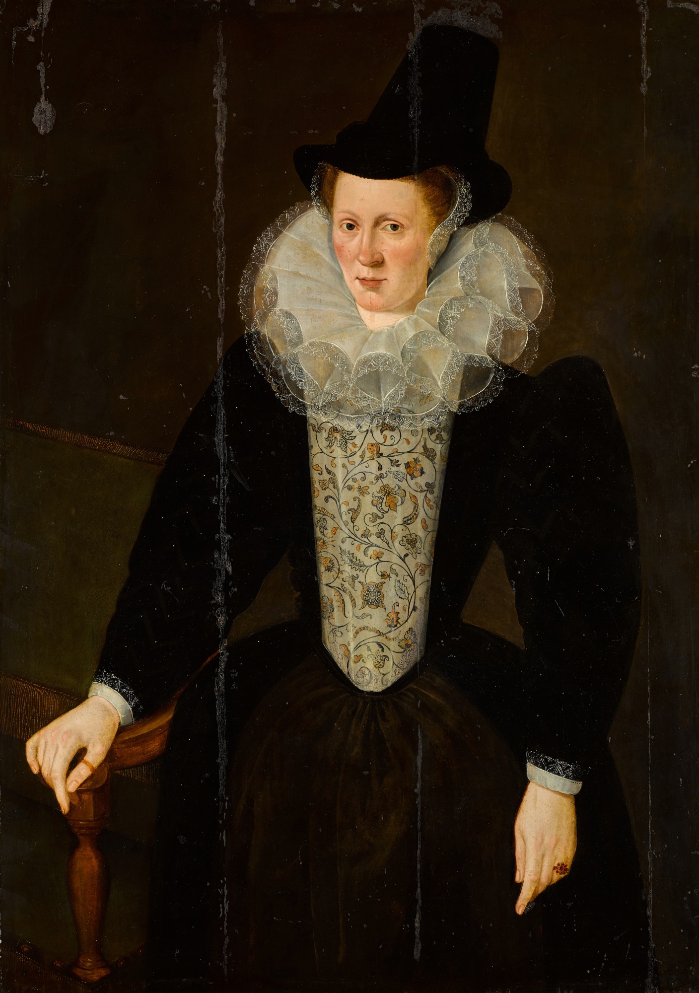 Unknown — Portrait of a lady, three-quarter-length, wearing a black dress with an embroidered stomacher, a white ruff and a black hat