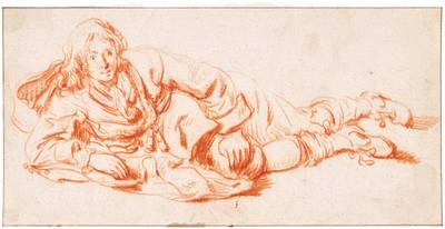 A man reclining, leaning on his right elbow