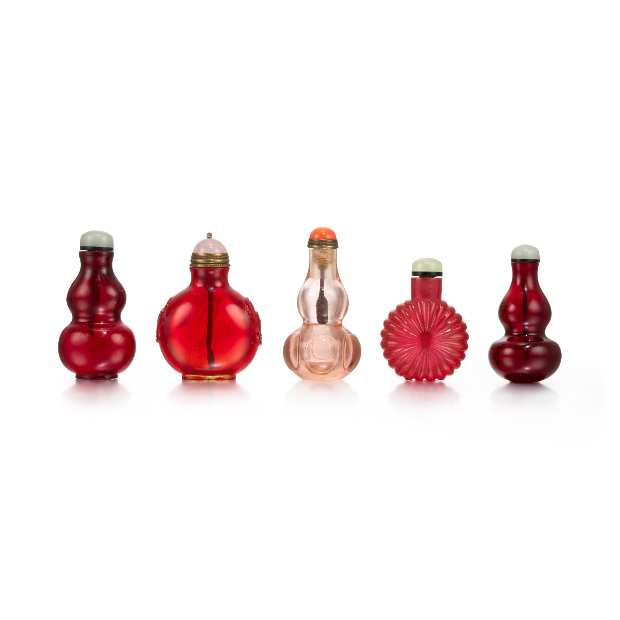 Five red glass snuff bottles