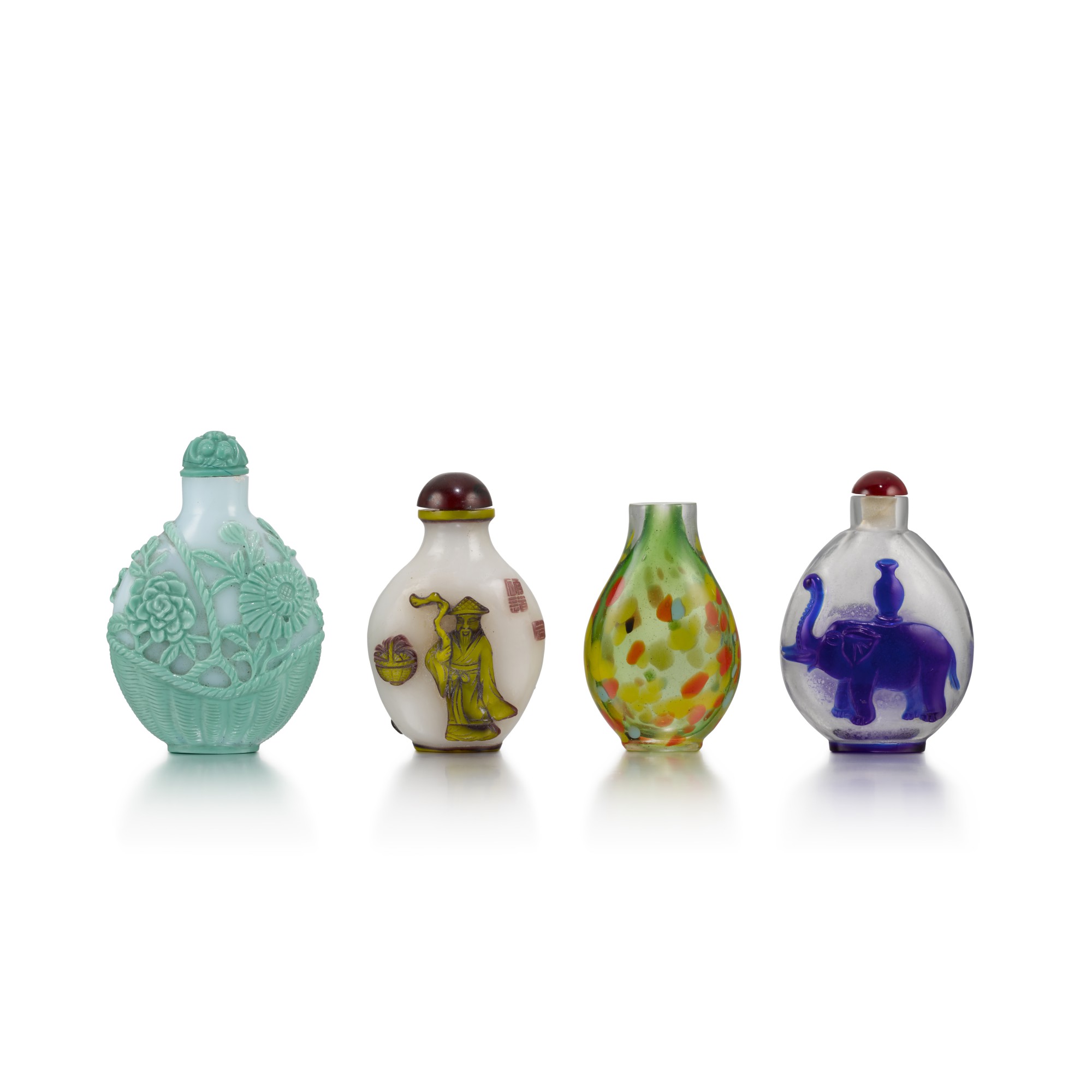 Four glass overlay snuff bottles