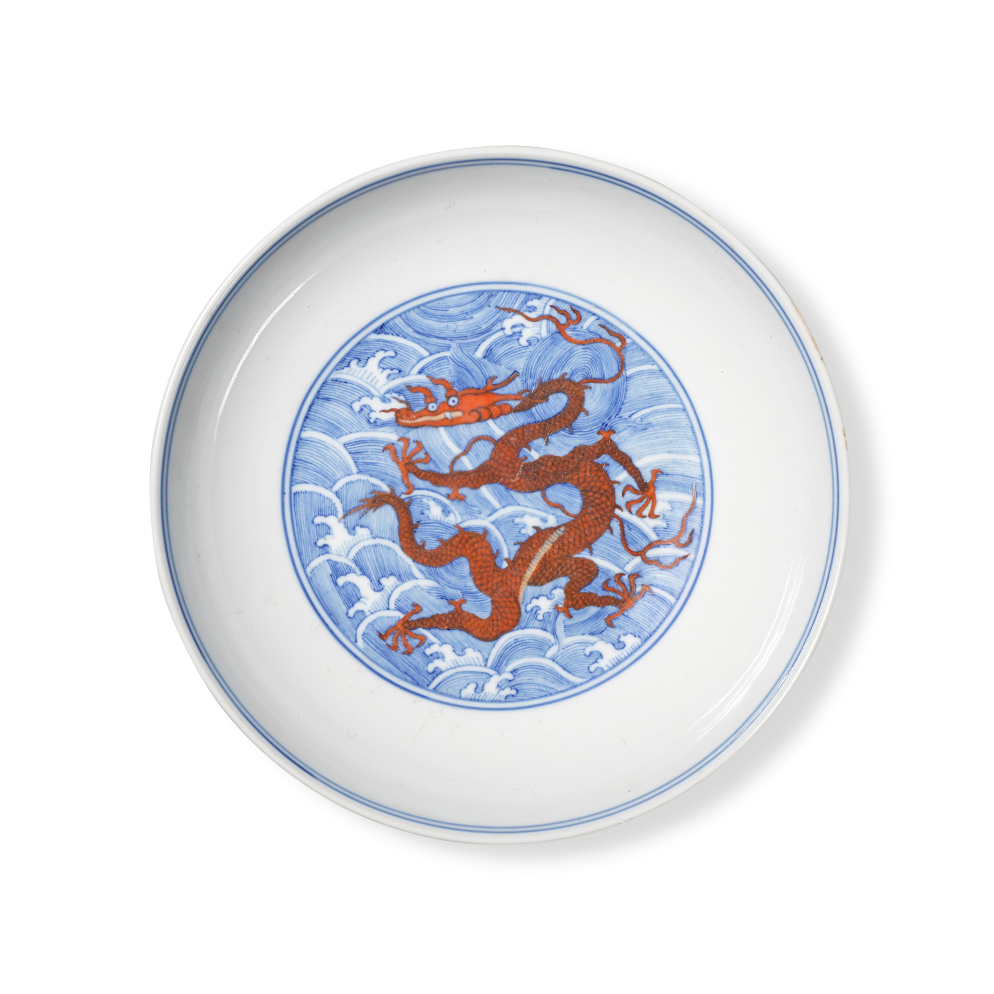 An iron-red and underglaze-blue 'dragon' dish — 清乾隆 青花礬紅彩海水龍紋盤 《大清乾隆年製》款