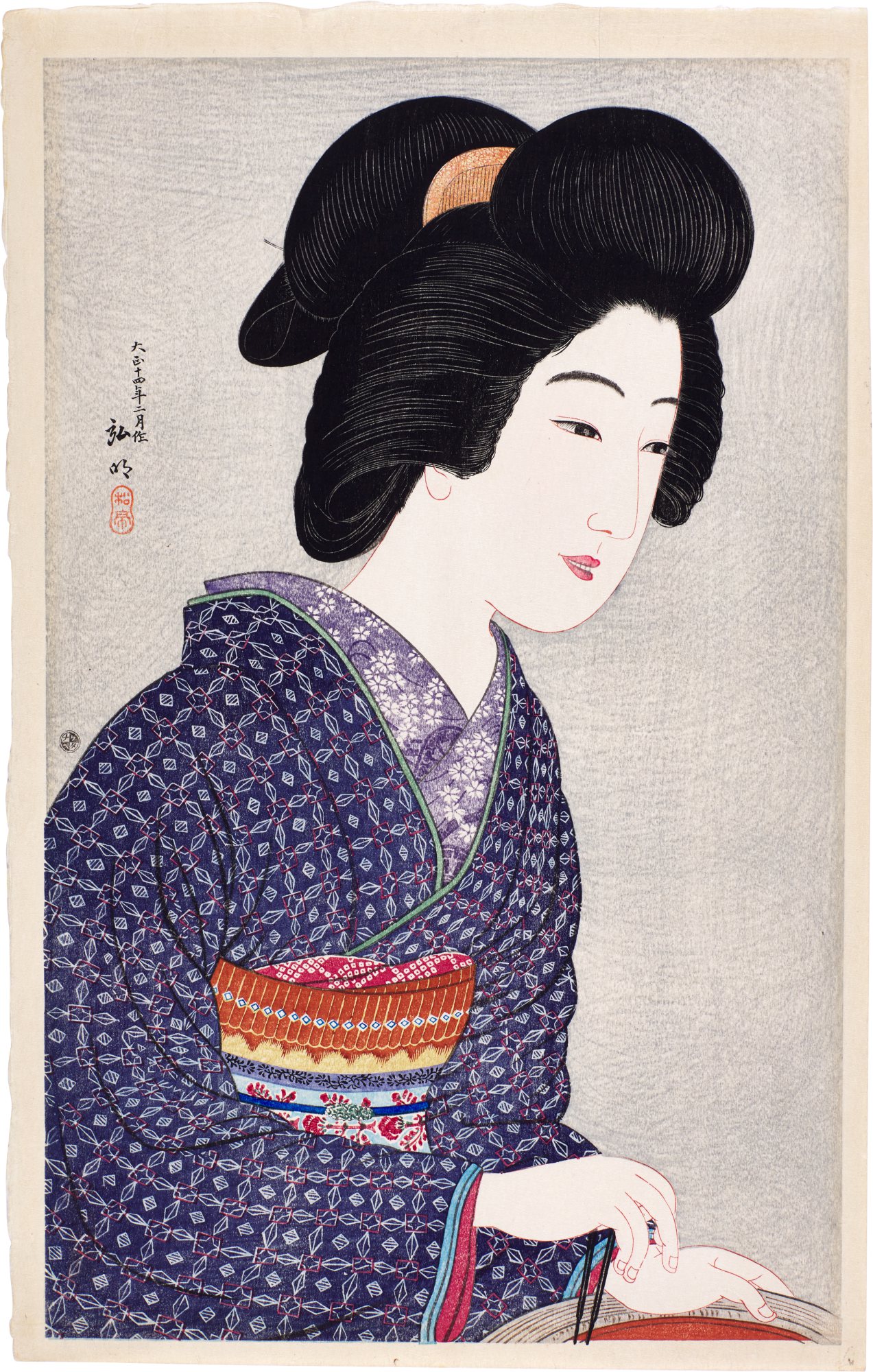 Geisha sitting by a brazier | Taisho period, early 20th century