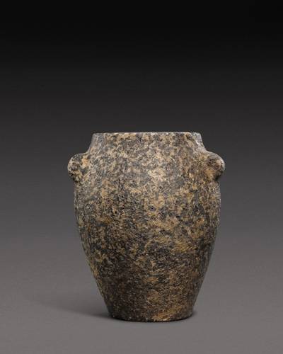 An Egyptian Breccia or Diorite Jar