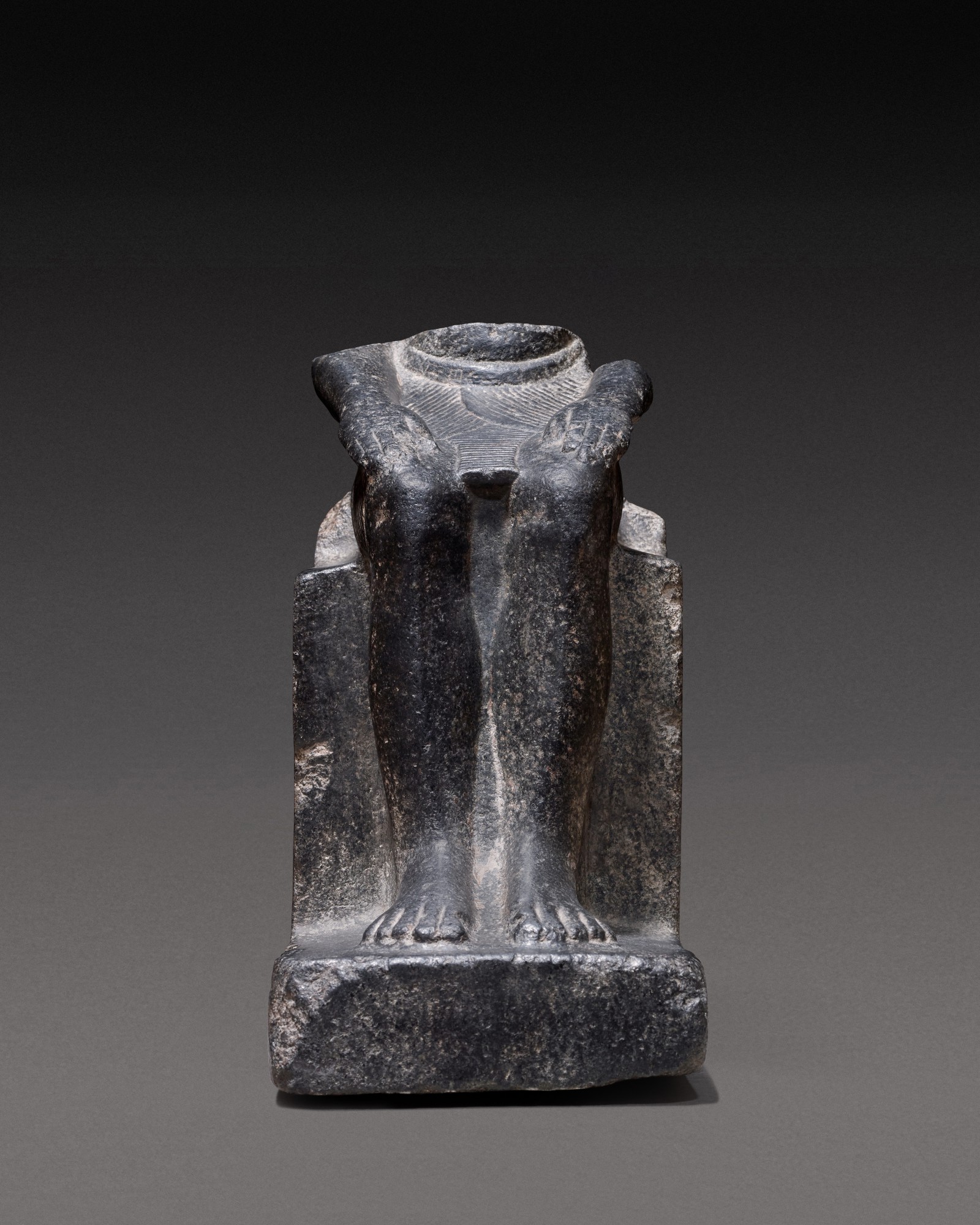 An Egyptian Granite Figure of a King — An Egyptian Granite Figure of a King, 12th/13th Dynasty, 1938-1640 B.C.
