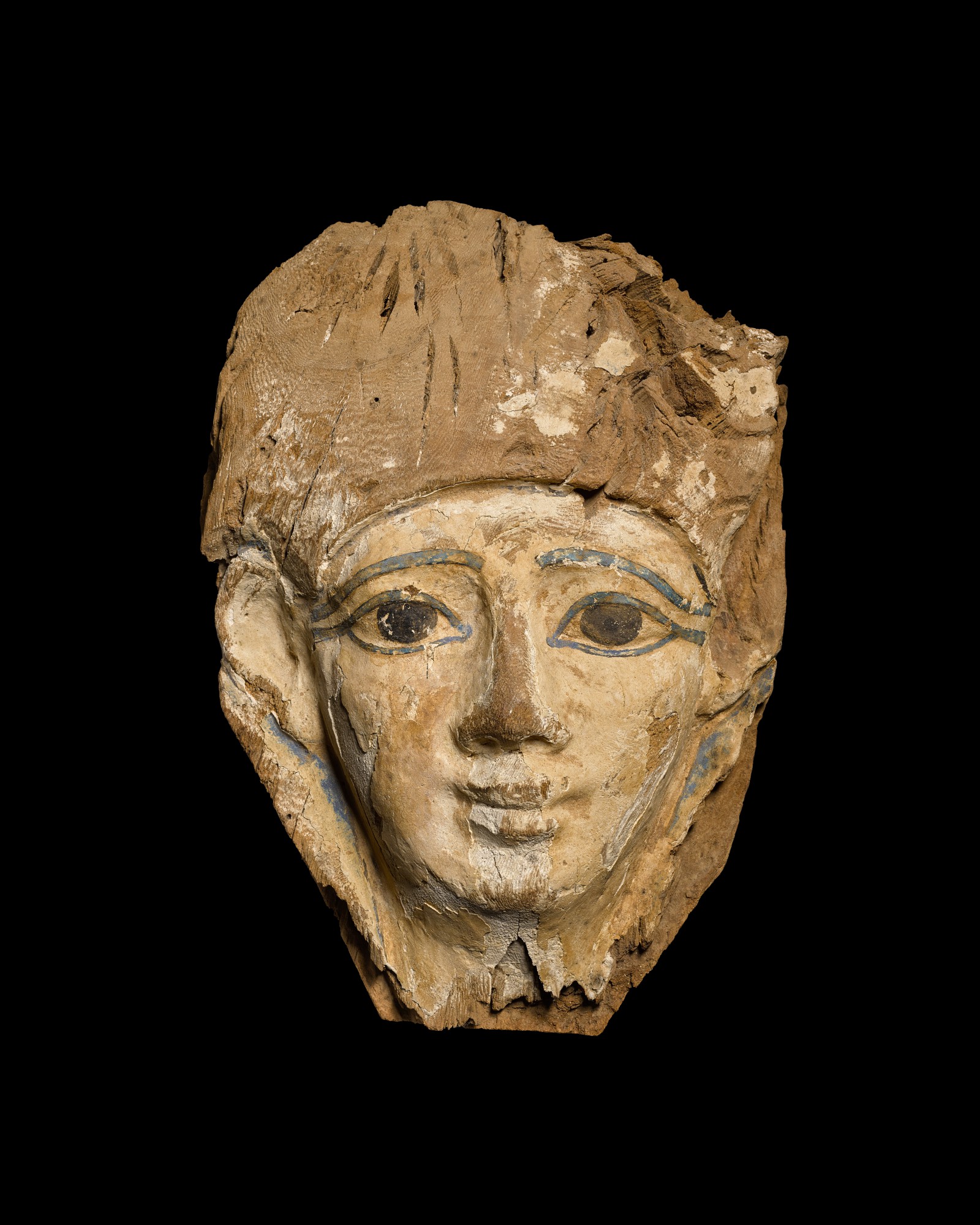 An Egyptian Wood Mummy Mask — An Egyptian Wood Mummy Mask, 20th Dynasty, 1190-1075 B.C.