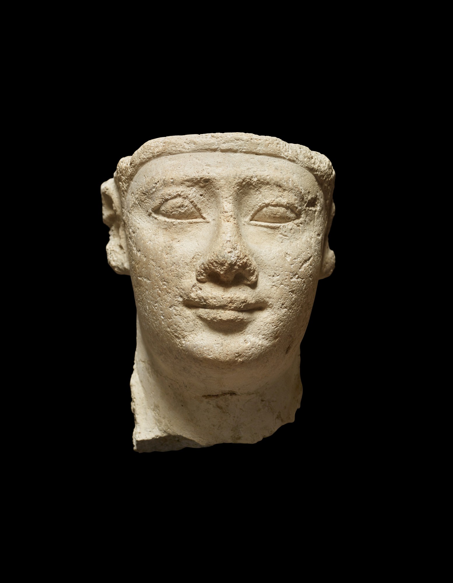 An Egyptian Stucco Sculptor’s Model Head — An Egyptian Stucco Sculptor’s Model Head, early Ptolemaic Period, circa 305-200 B.C.