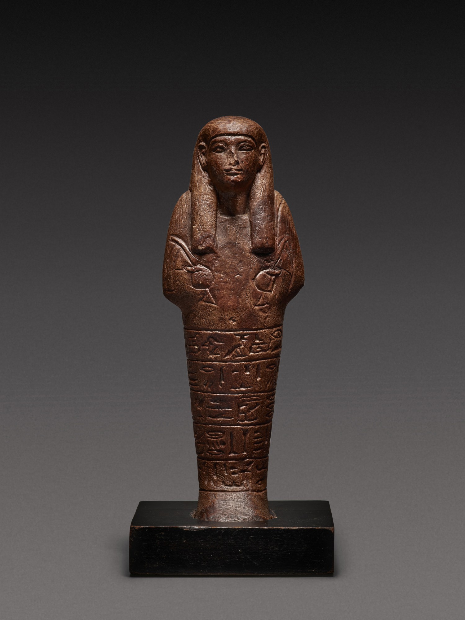 An Egyptian Sandstone Ushabti — An Egyptian Sandstone Ushabti, 18th/early 19th Dynasty, circa 1540-1280 B.C.