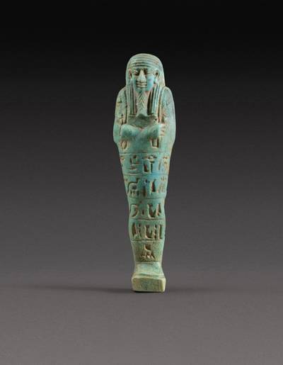 An Egyptian Turquoise Faience Ushabti, 30th dynasty, 380-342 B.C.