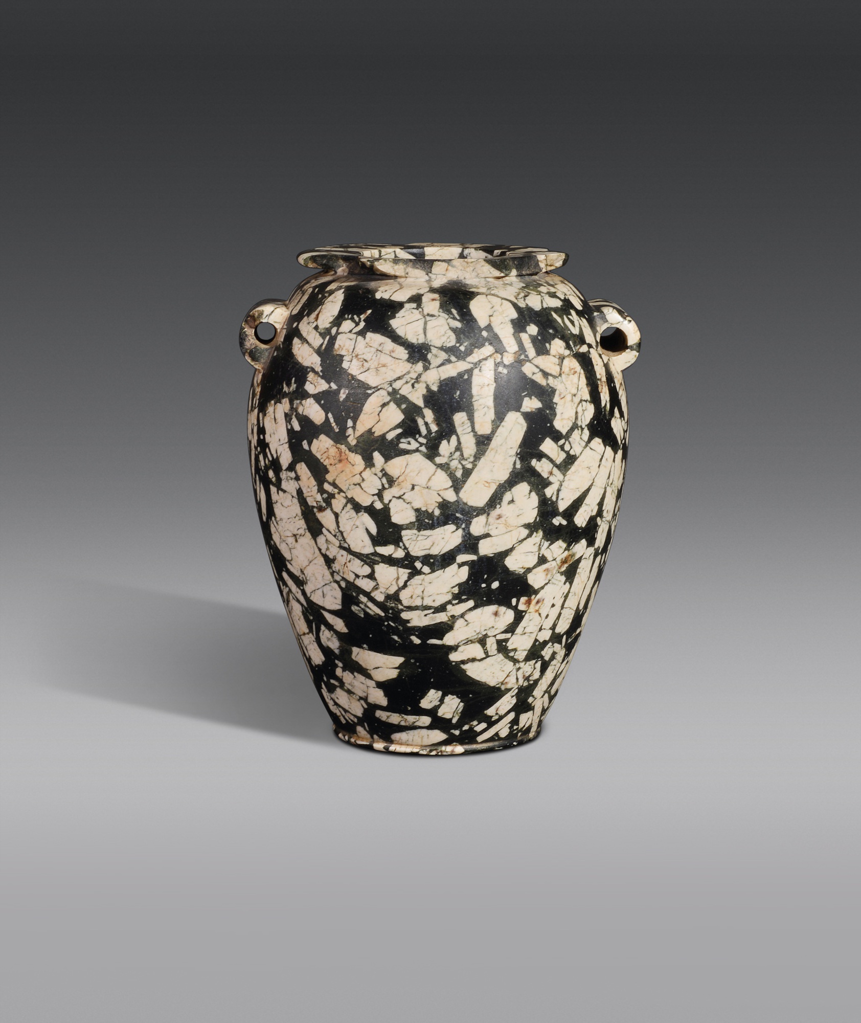 An Egyptian Porphyritic Diorite Jar — An Egyptian Porphyritic Diorite Jar, Predynastic Period (Nagada II)/1st Dynasty, circa 3500-2900 B.C.