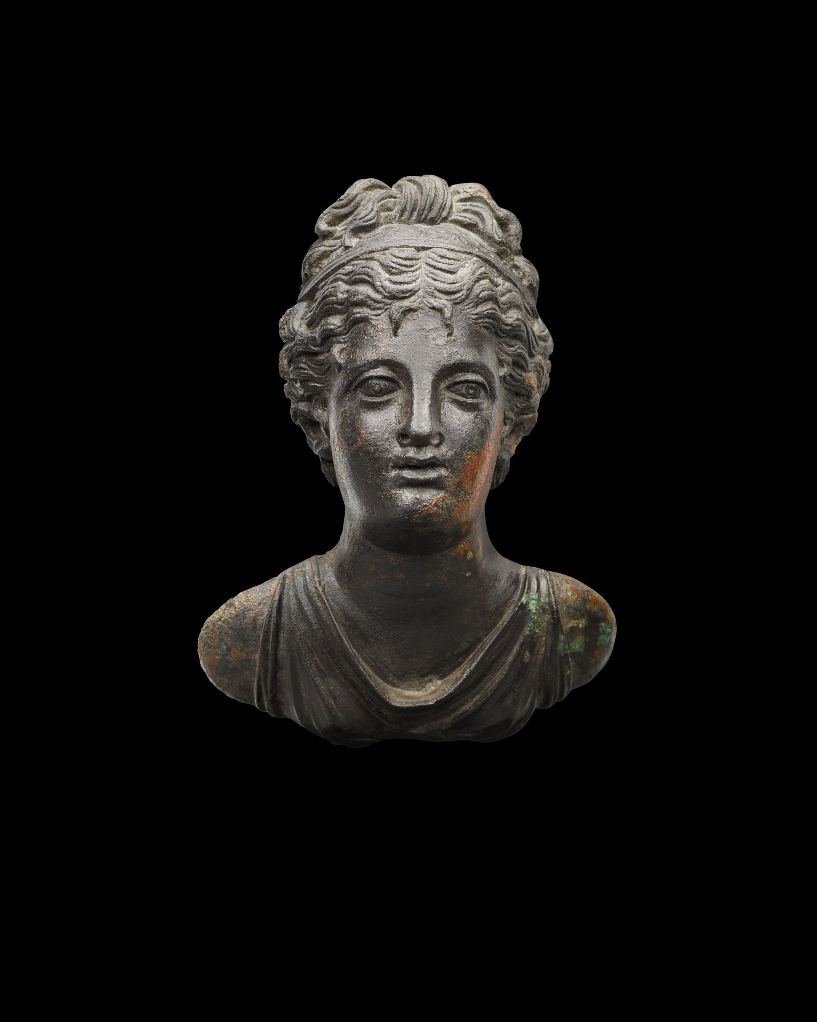 A Roman Bronze Applique Bust of a Goddess, circa mid 2nd Century A.D.